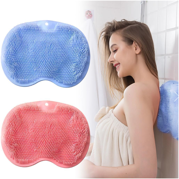 Woman leaning her back on the scrubber stuck to the shower wall